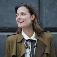 stylish-cheerful-woman-in-coat-on-street-3771343